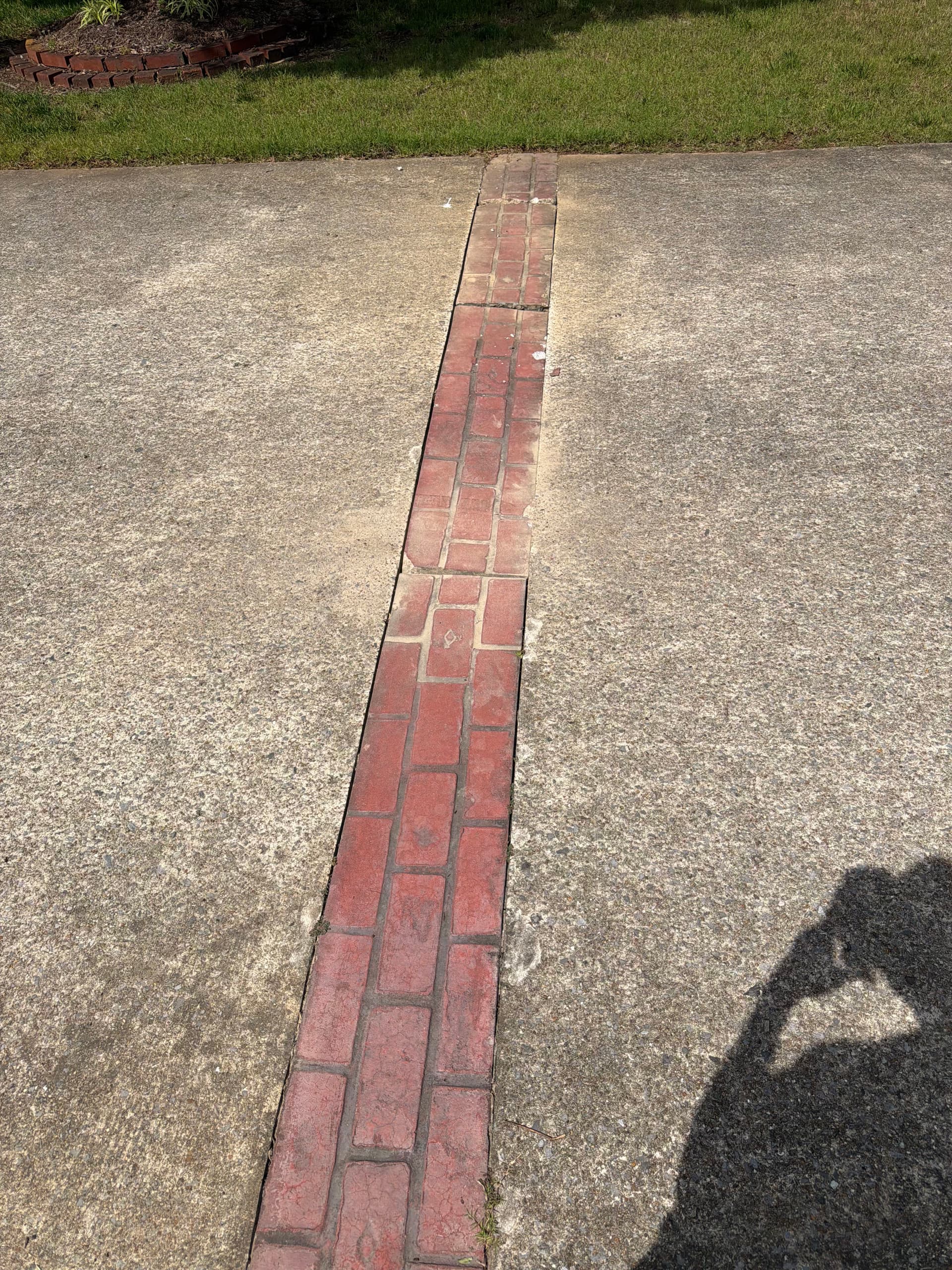 Gallery photos for Sinking Driveway Strip Repair and Re-Stamp in Chattanooga: Image #3