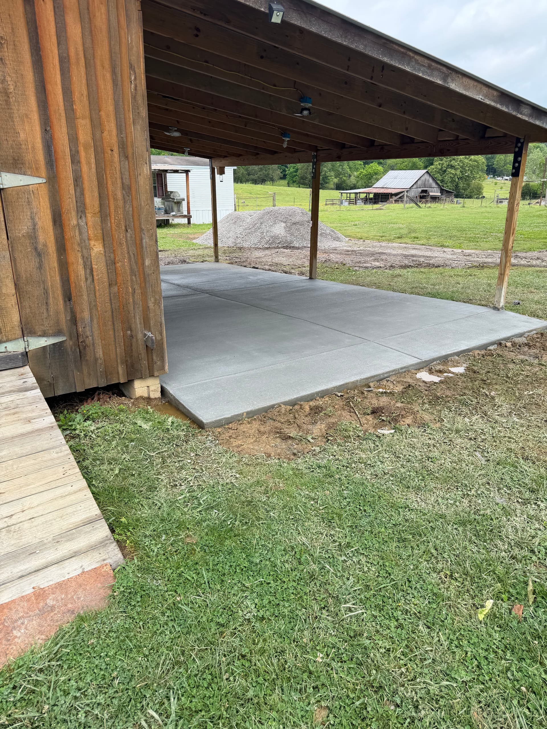 Gallery photos for 25x15 Concrete Slab Poured for a Tractor Work Space: Image #3